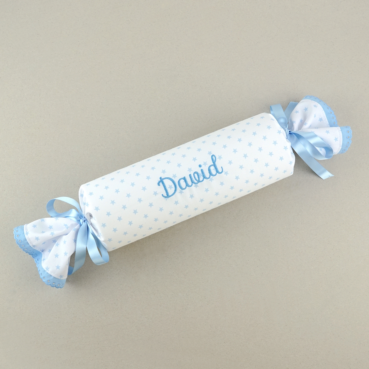 Cojín Antivuelco Caramelo Estrellas Azules personalizado